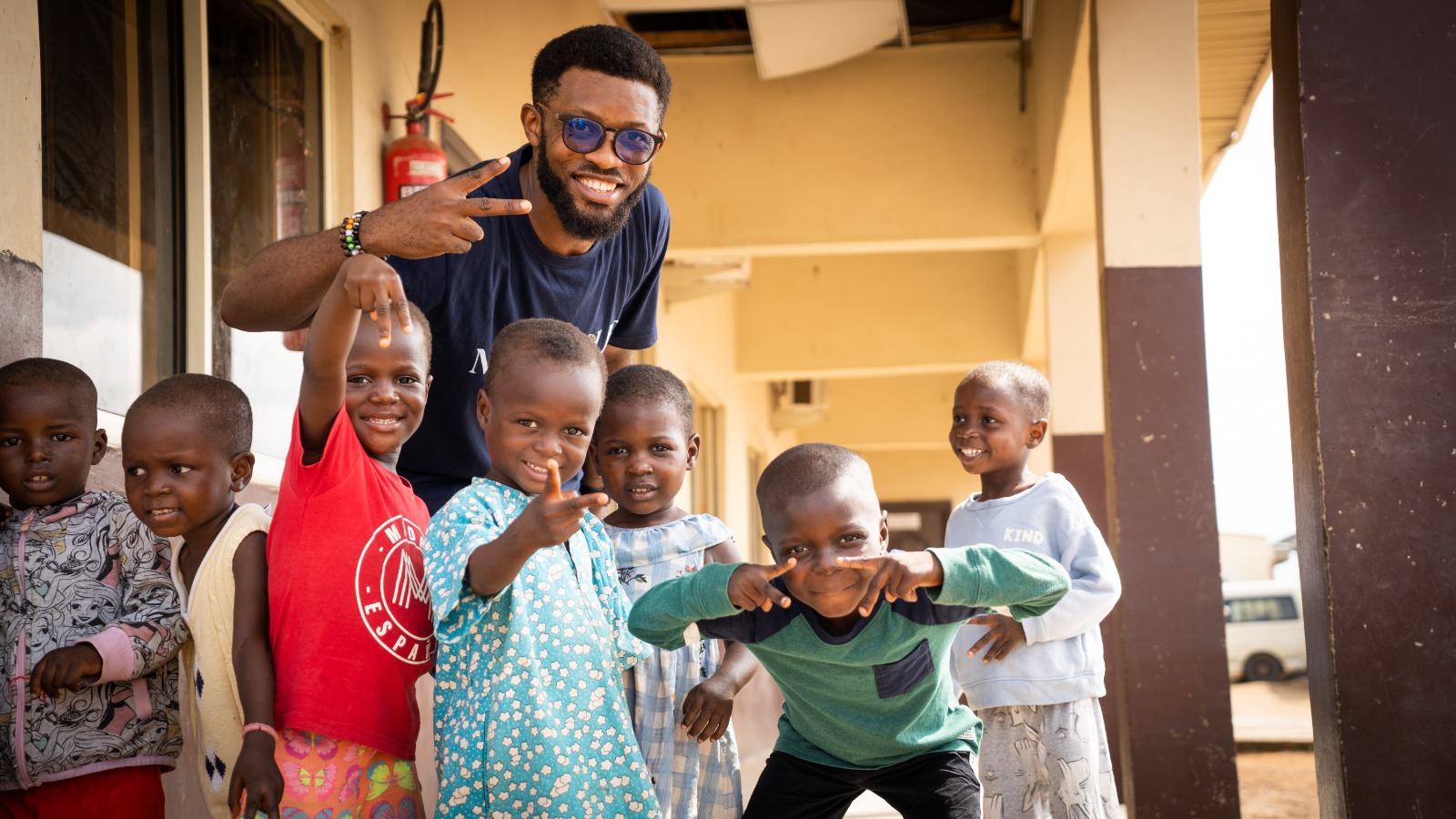 MedWHOLE team member engaging with children during a community programme